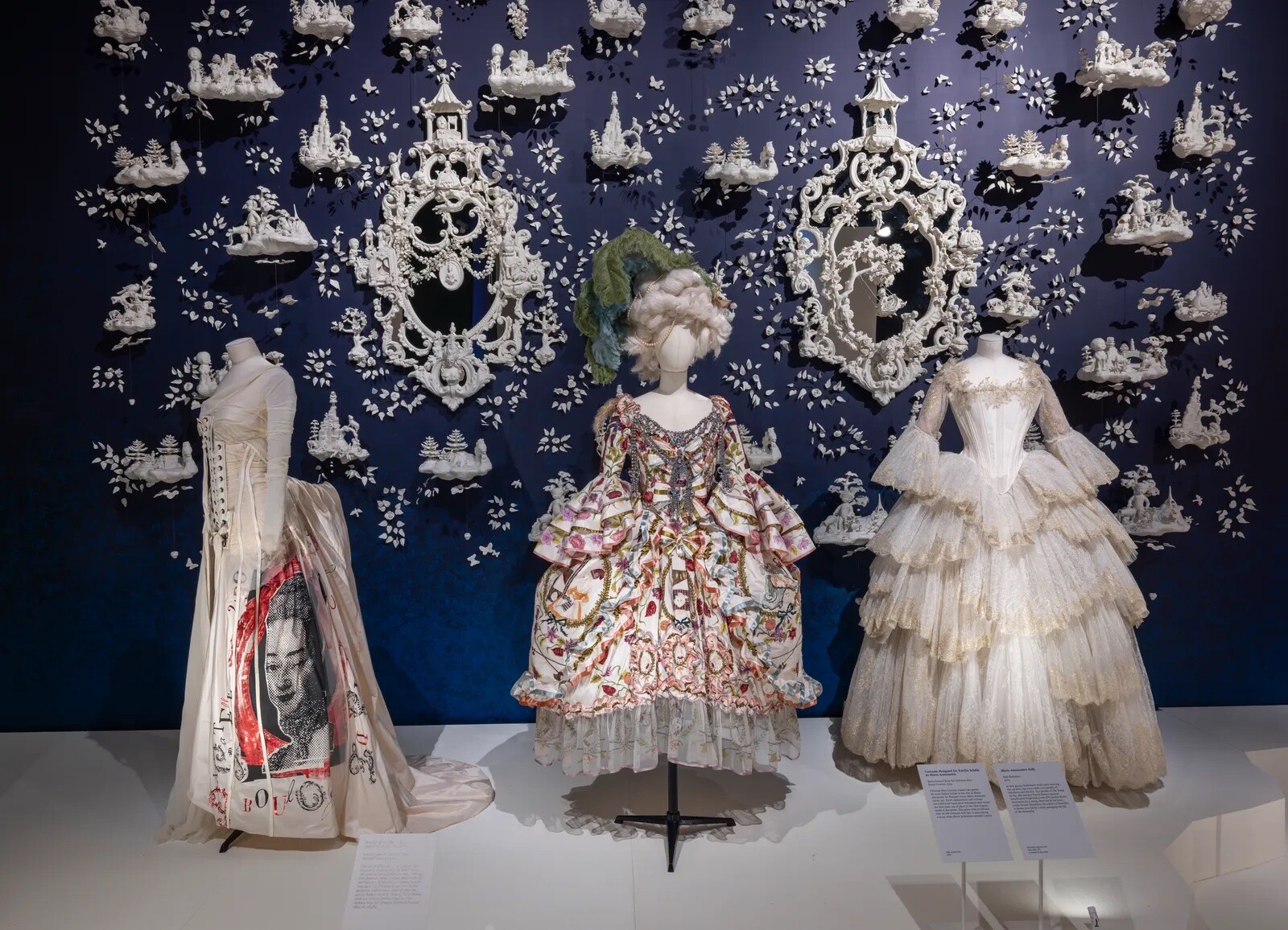 John Galliano’s Marie Antoinette-inspired Dior couture pieces sit beside Maria Grazia Chiuri’s custom Dior couture for the BBC’s Marie Antoinette, behind which you’ll see Beth Katleman’s “Marie Antoinette’s Folly”. Photo: Peter Kelleher